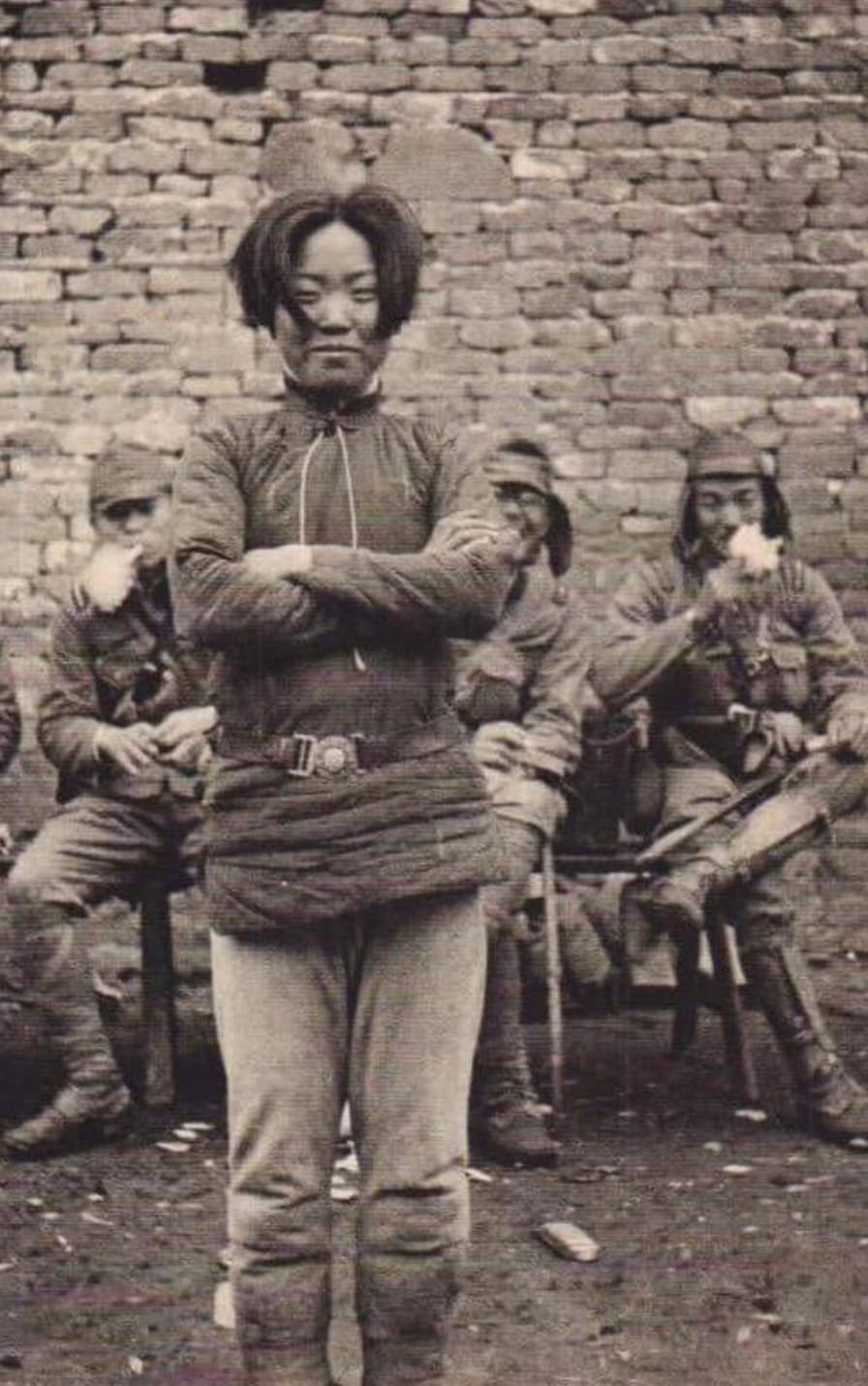 “Chinese communist spy smiling and laughing immediately prior to his execution by the retreating KMT forces in Shanghai. In 1949, just 16 days before the PLA took Shanghai, Zhu Datong laughed in the face of death, well aware of the coming victory.”